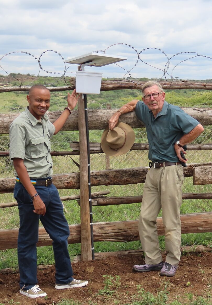 David Mascall explaining the Lion Lights to Onesmus ole Irungu