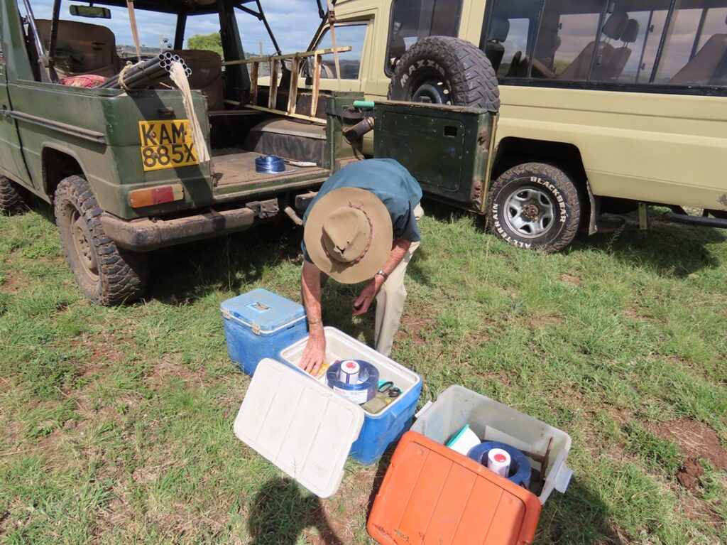 David Mascall installing the lights Elvira Wolfer sponsored, after a girl was killed by a lioness in Emakoko under really sad and accidental circumstances and some Maassai lost their livestock to predators.