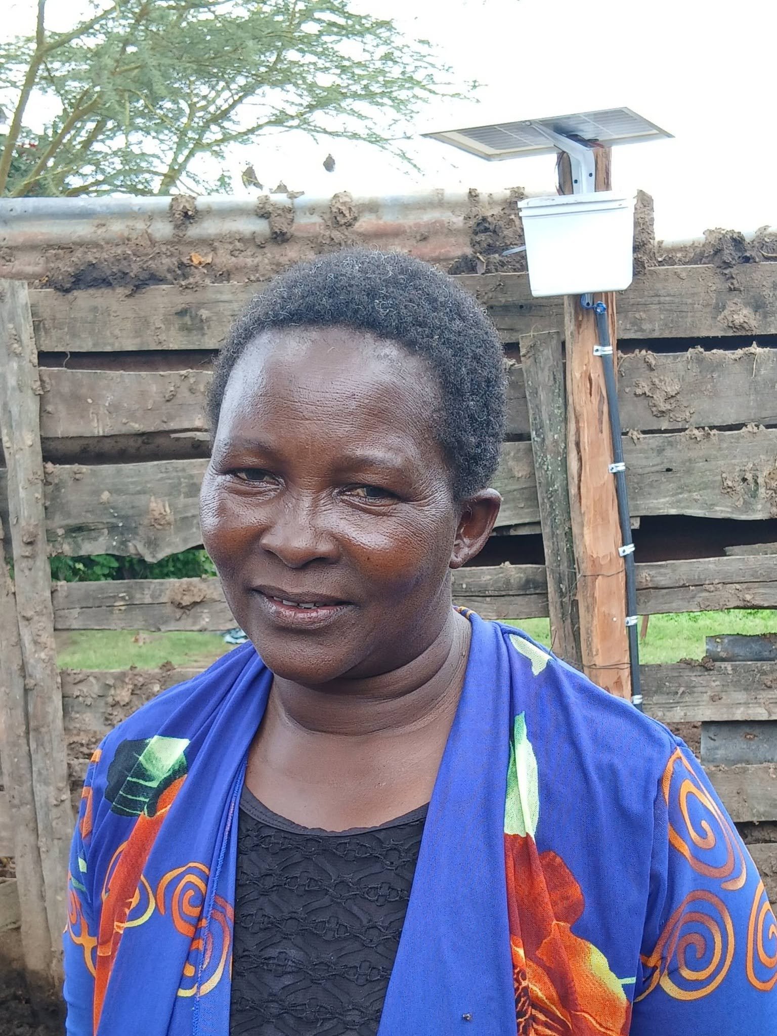 Gladys Kipees after recieving her life saving Lion Lights installation